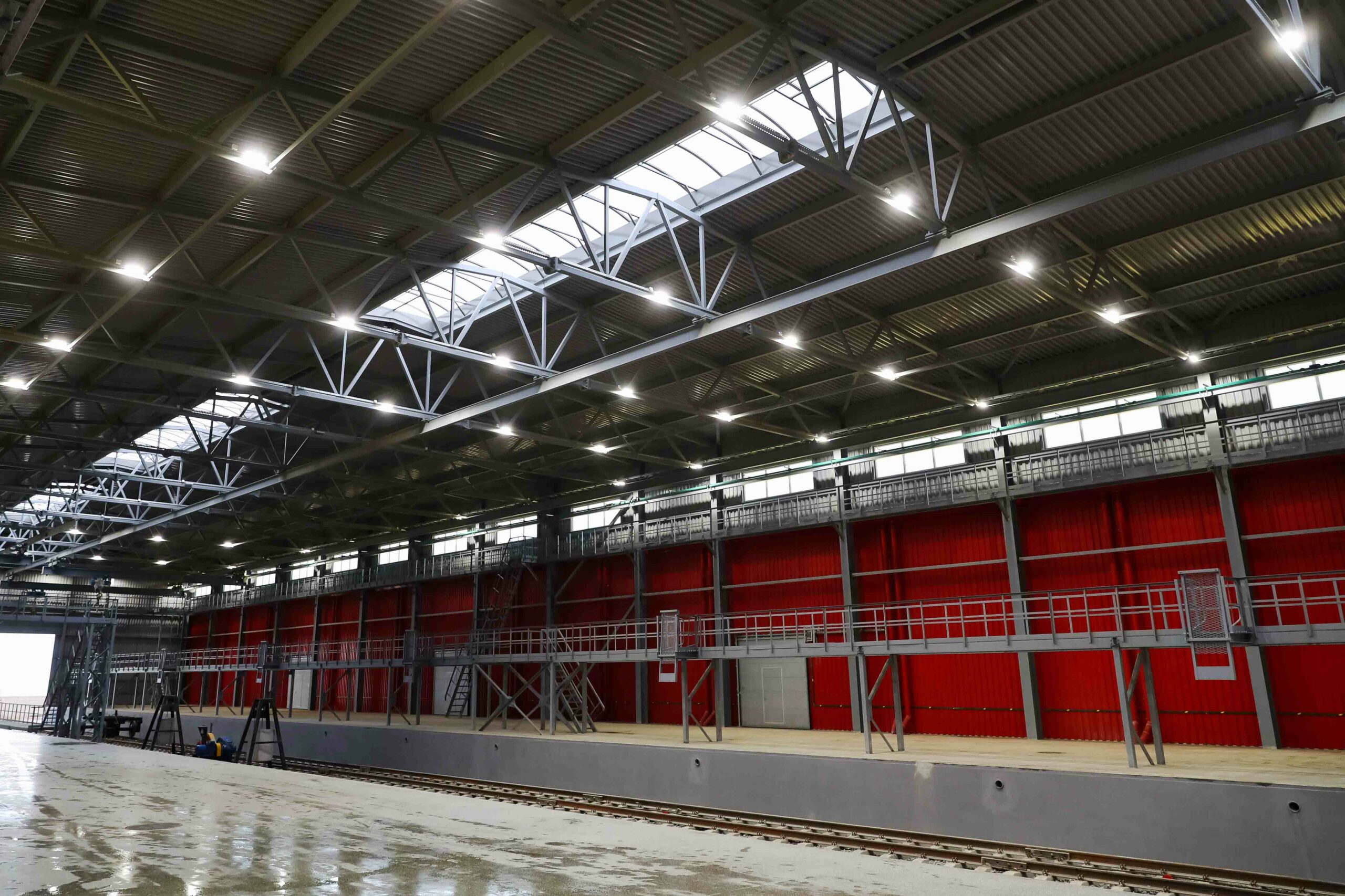 The railway which leads to a huge hangar for storing products in the enterprise
